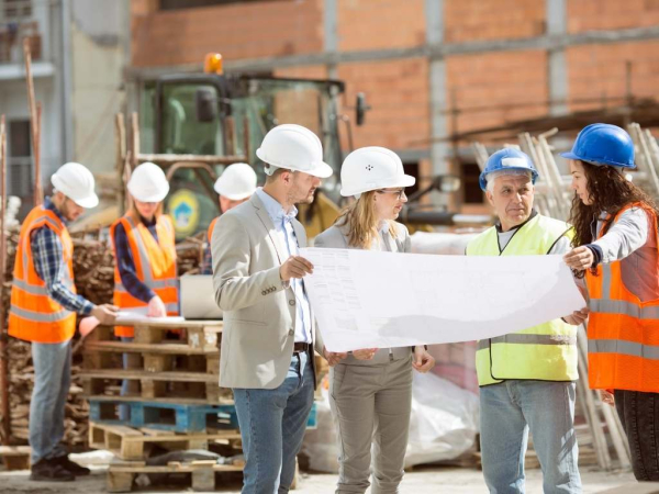 Team training near a construction site.